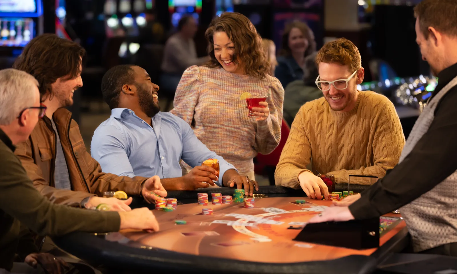 Group of people playing blackjack at Little River Casino Resort