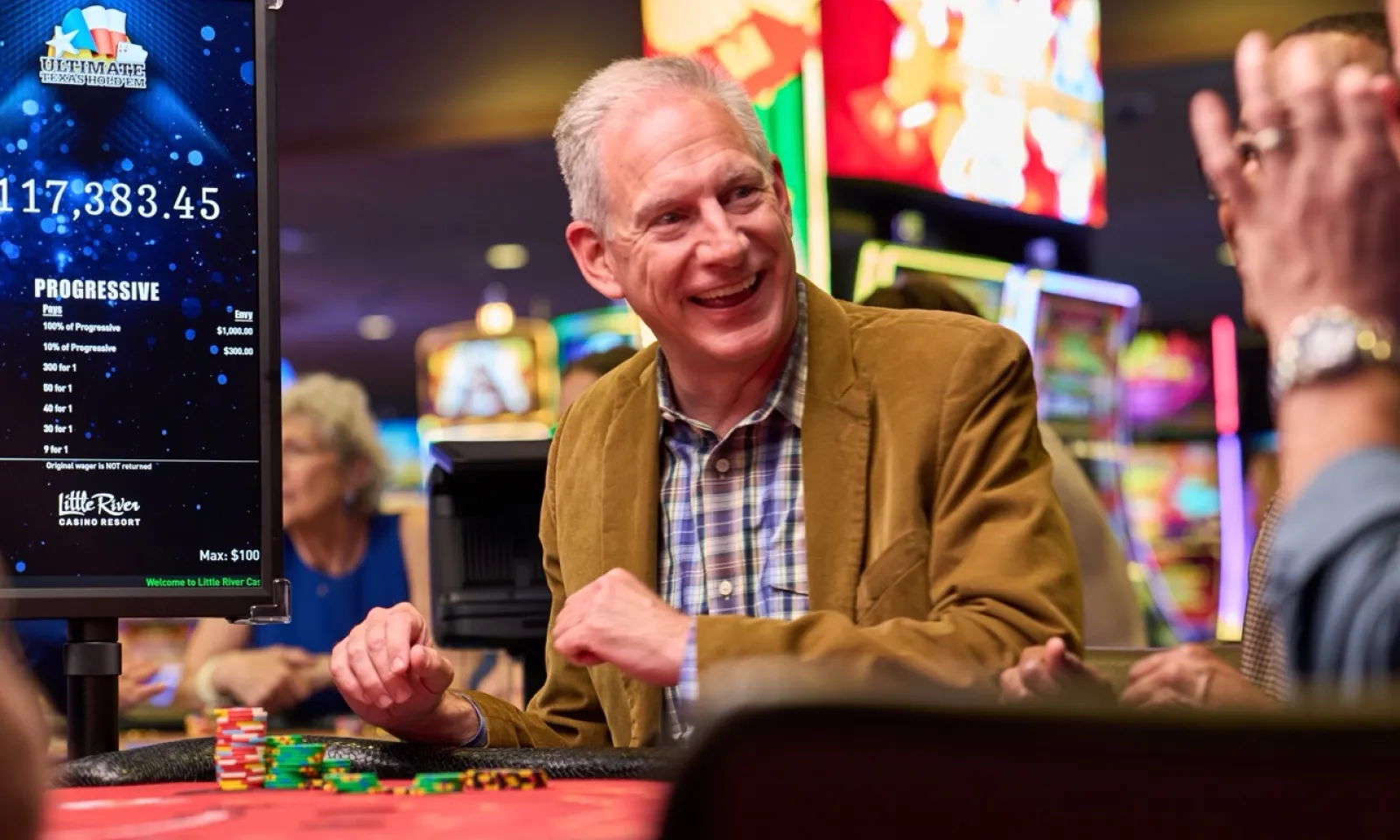 Man playing Ultimate Texas Hold Em 